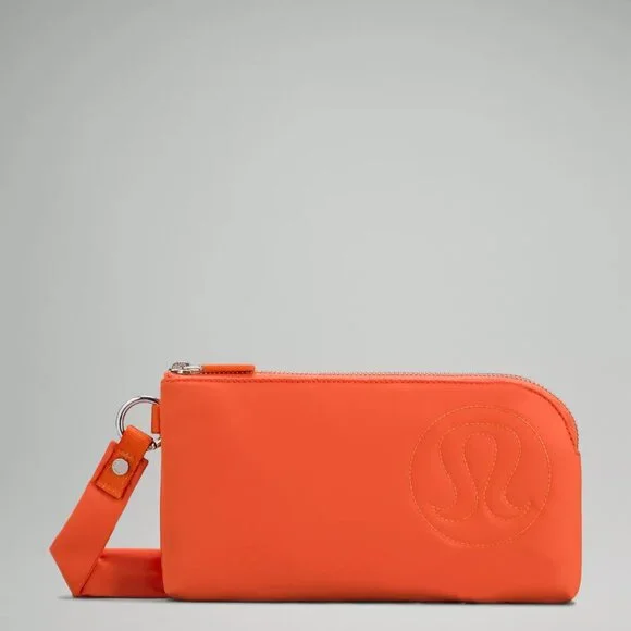 Lululemon Now and Always Puffy Pouch Wristlet in Orange - Picture 1 of 8